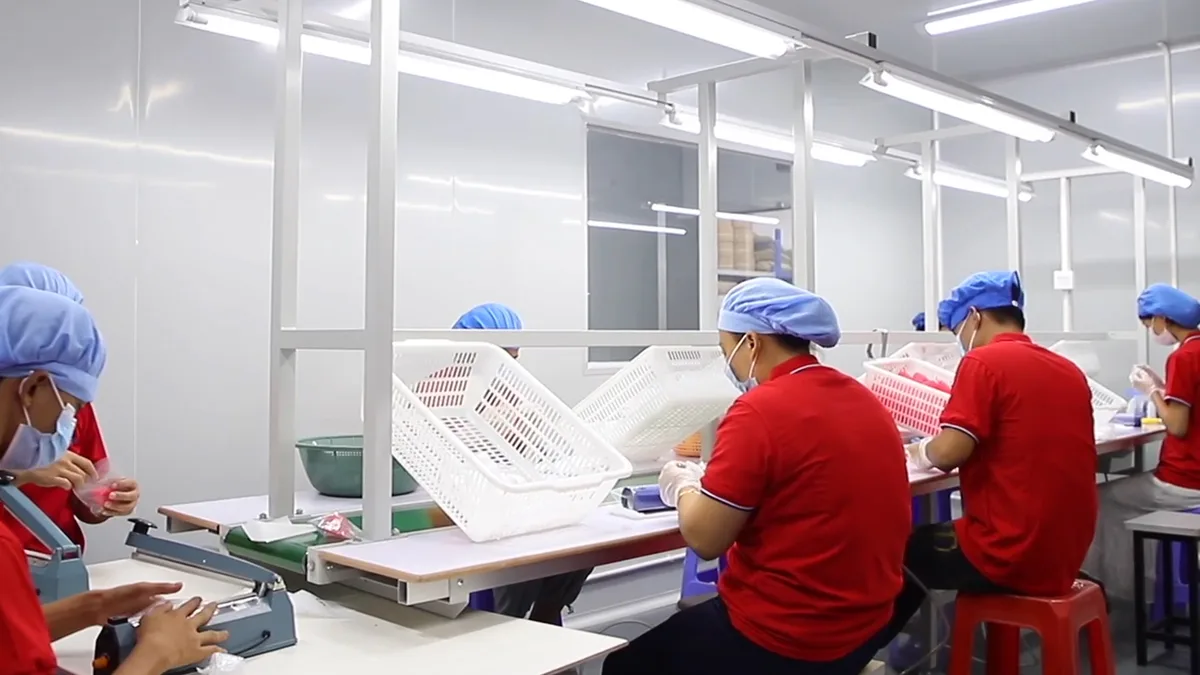 Menstrual cup factory production floor with LSR molding and clean manufacturing layout