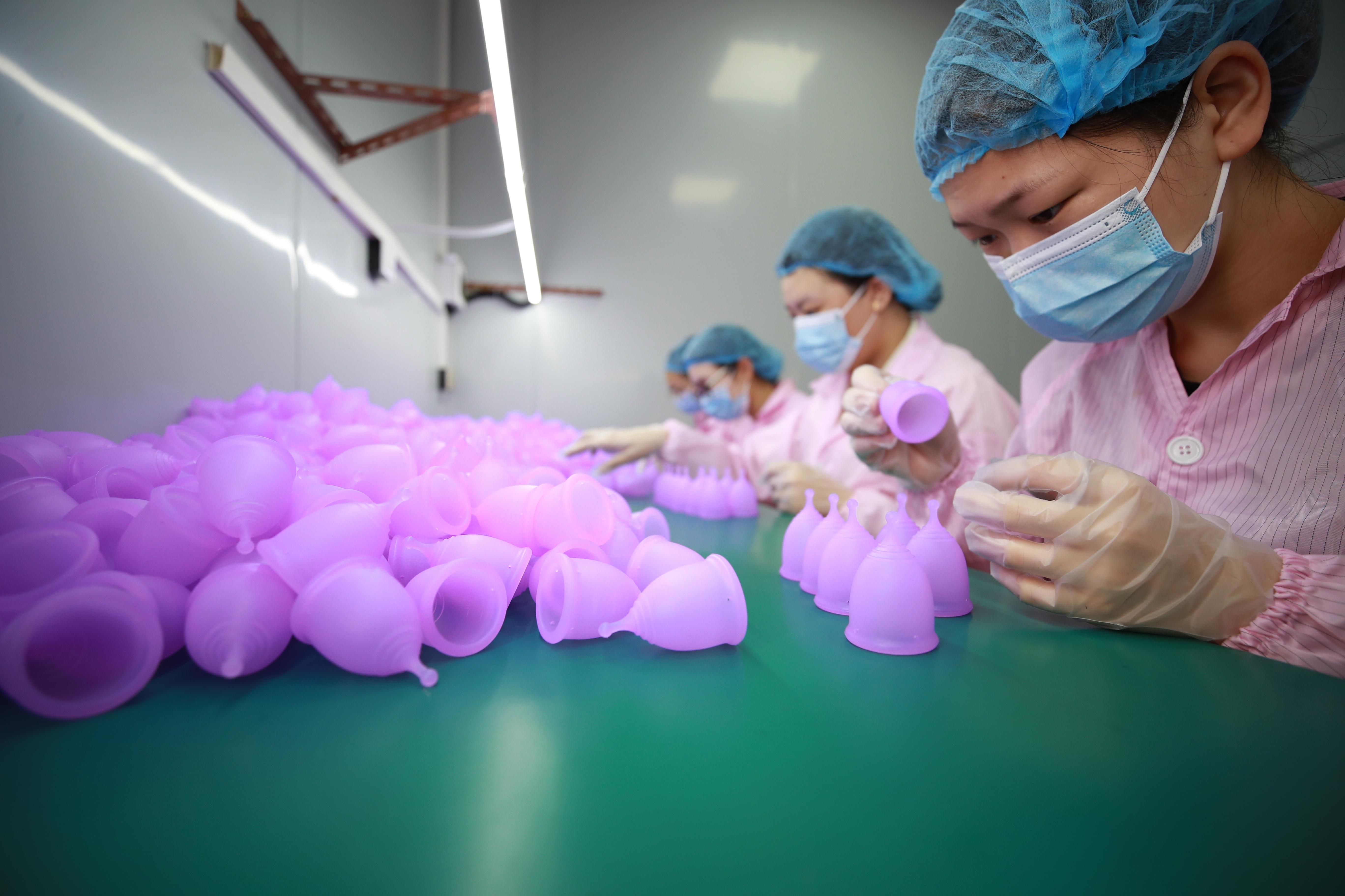 HEPA air purification and filtration modules in cleanroom ceiling above silicone production floor